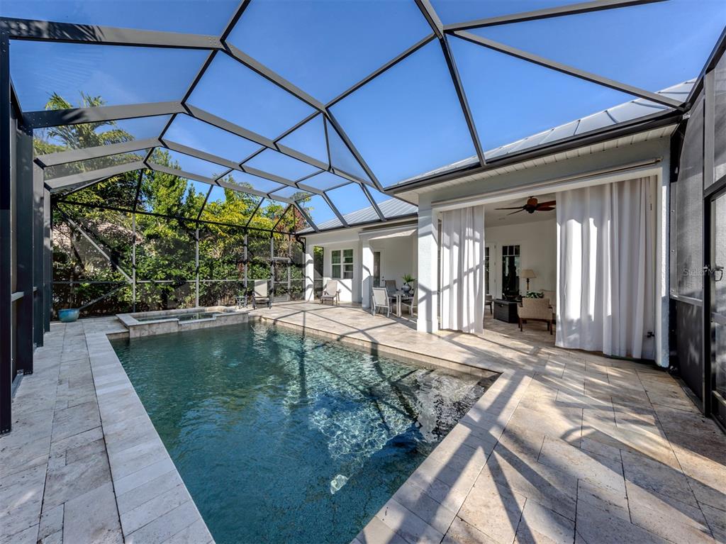 332 Pensacola Road Venice, FL 34285 - Photo 28 of 56 a view of a backyard with sitting area