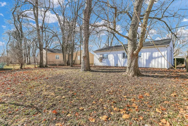 front view of a house with a tiny house
