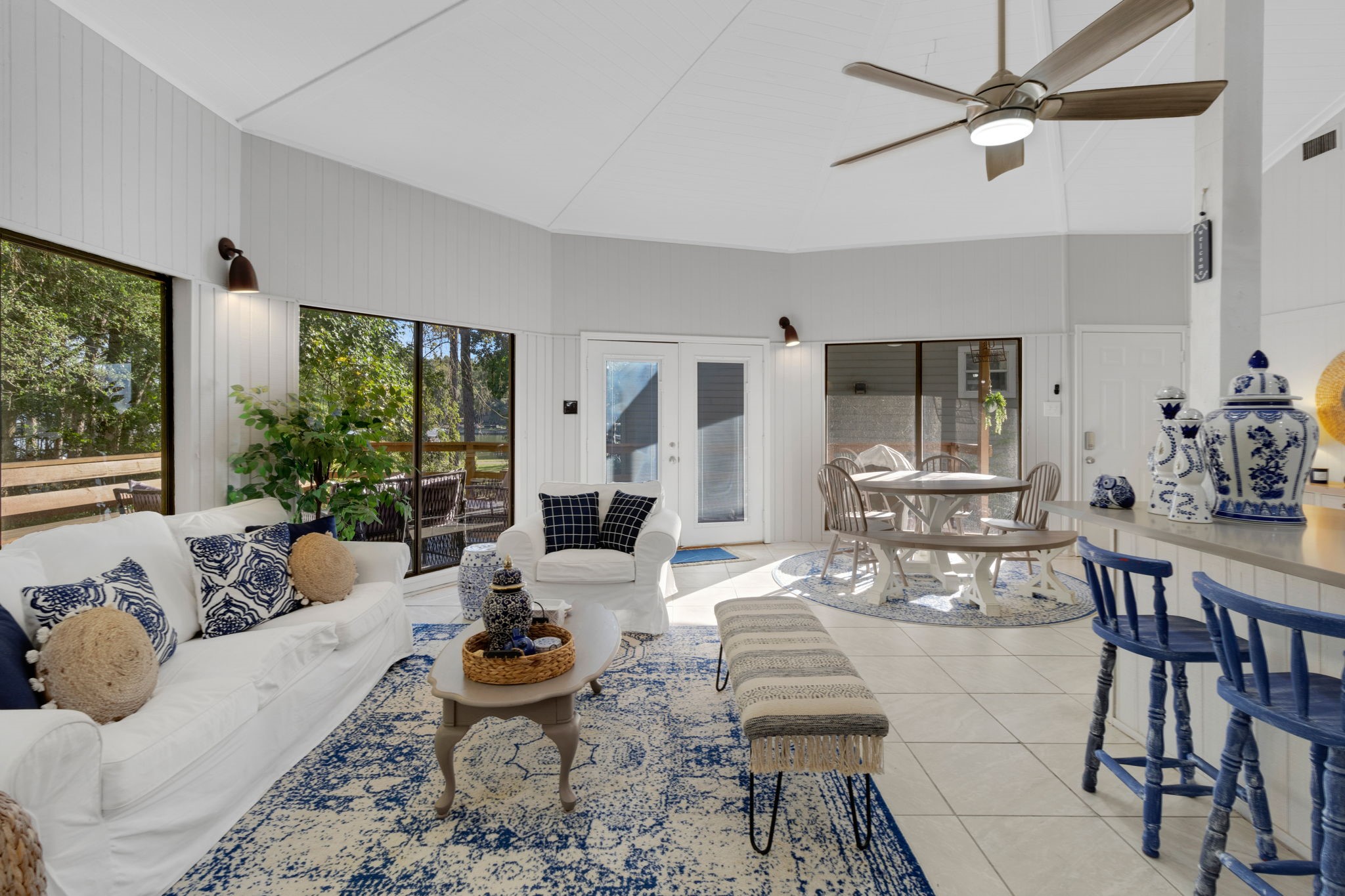 90 Harbour Lane Coldspring, TX 77331 - Photo 10 of 40 Living and dining areas with easy access to the back deck, perfect for indoor-outdoor enjoyment.