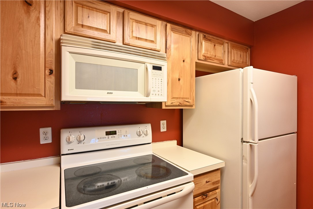 28140 Detroit Road, Unit A1 Westlake, OH 44145 - Photo 15 of 30 Kitchen featuring white appliances