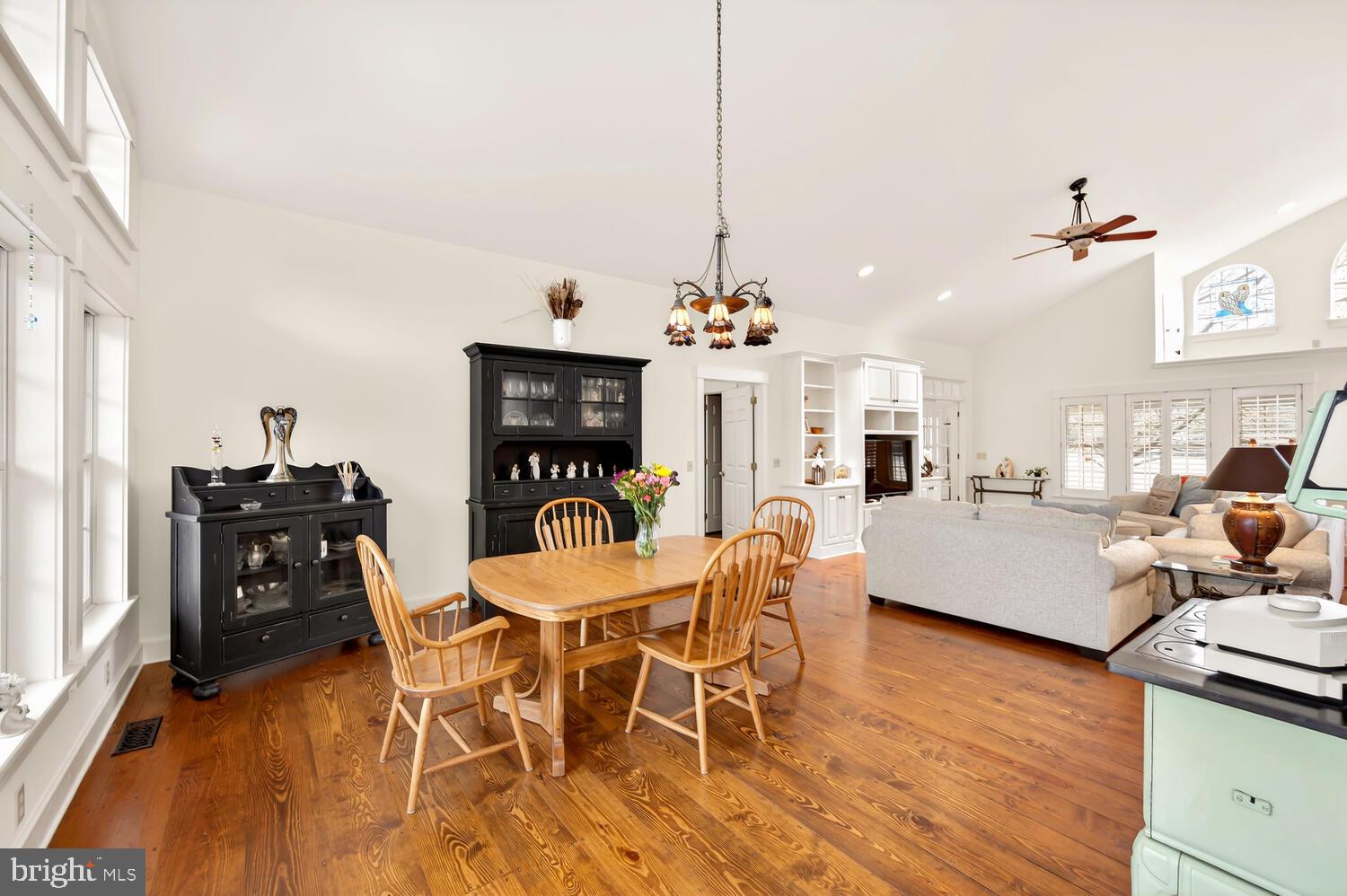 7605 Pendleton Farm Road Easton, MD 21601 - Photo 20 of 62 a view of a dining room with furniture and wooden floor