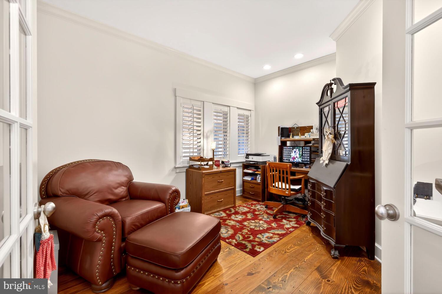 7605 Pendleton Farm Road Easton, MD 21601 - Photo 25 of 62 a room with furniture a window and gym equipment