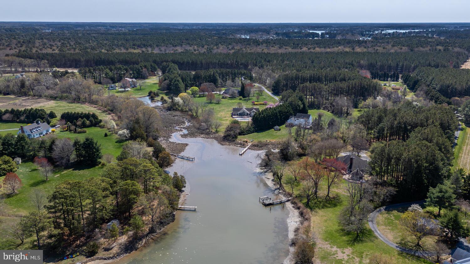 7605 Pendleton Farm Road Easton, MD 21601 - Photo 58 of 62 an aerial view of a house with a lake view