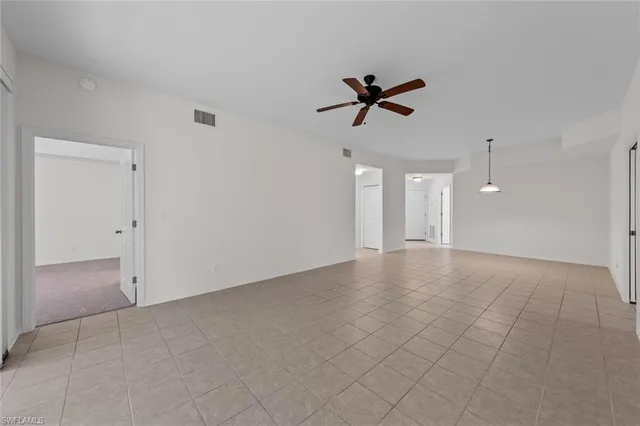 a view of a big room with carpet