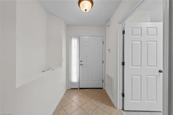 a view of entryway with front door