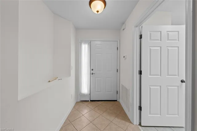 a view of entryway with front door