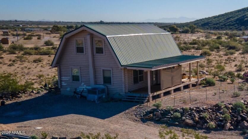 38941 West Buckeye Road Tonopah, AZ 85354 - Photo 1 of 1 a view of a house with a balcony