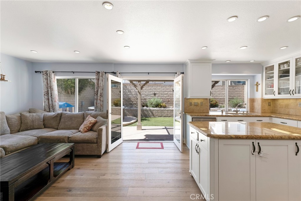 3843 San Gabriel Street Simi Valley, CA 93063 - Photo 23 of 52 a living room with furniture and a large window