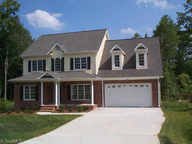 7993 Bartonshire Drive Oak Ridge, NC 27310 - Photo 1 of 1 Exterior Front.