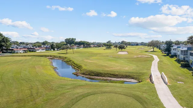 a view of a swimming pool and an ocean view