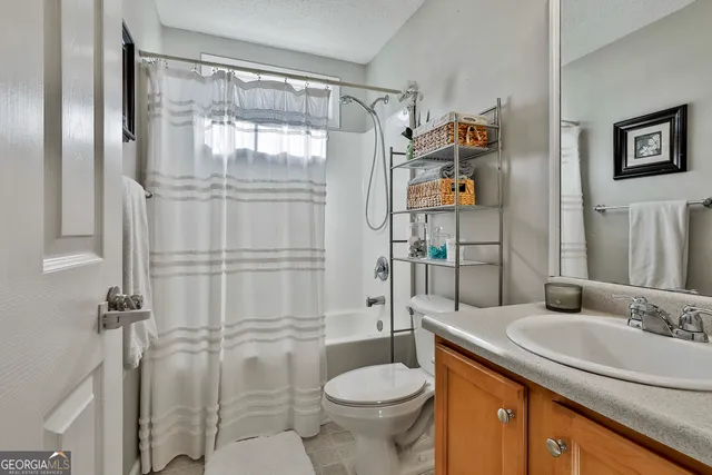 a utility room with mirror in it
