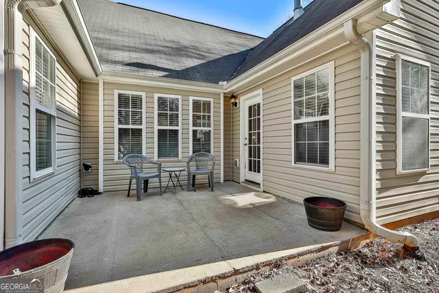 a view of residential houses with outdoor space