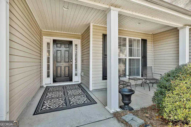 a view of a entryway door front of house