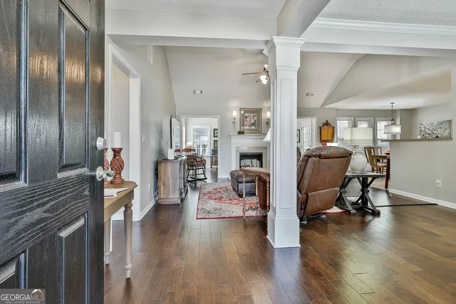 a view of a living room and dining room