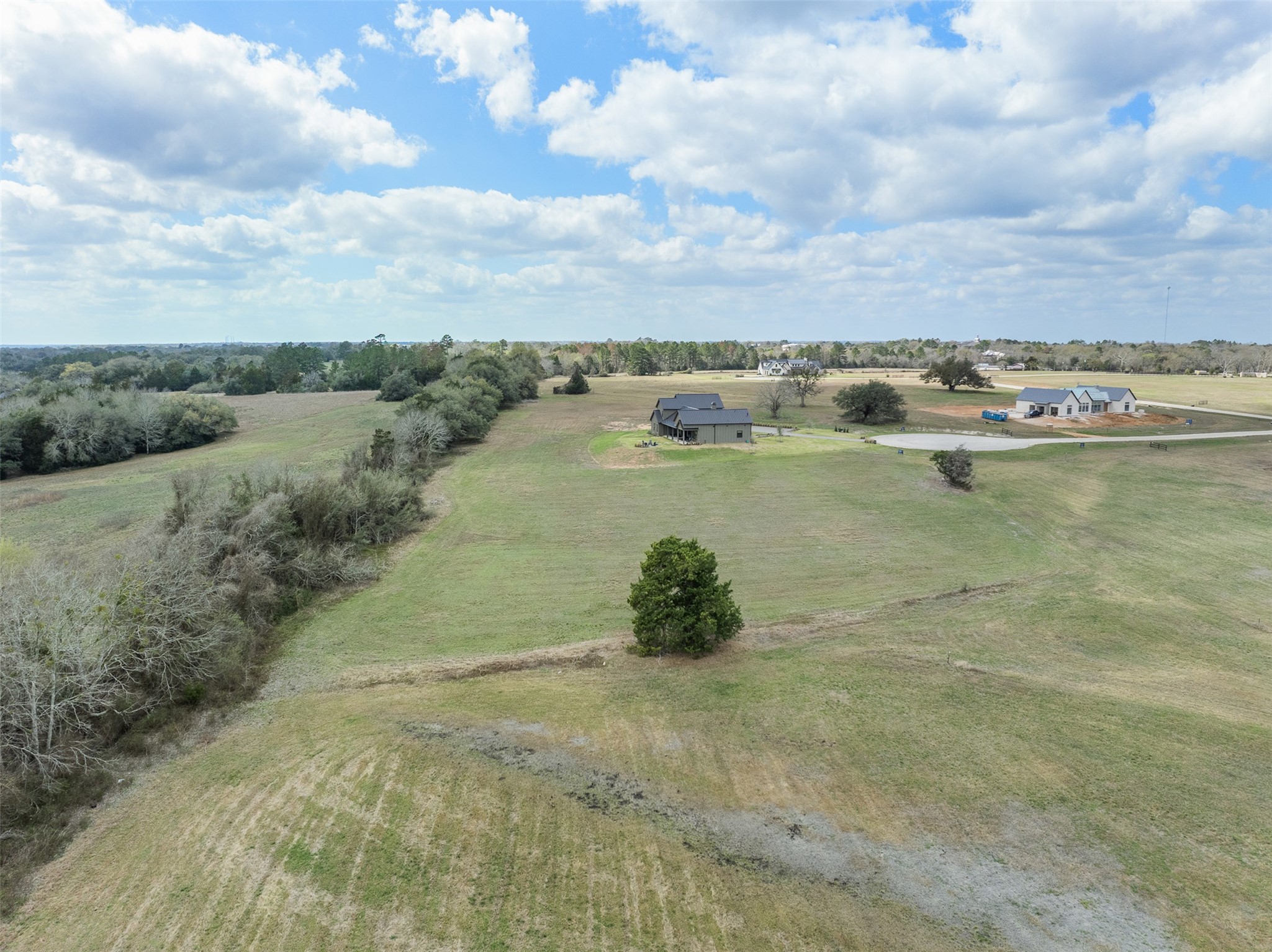 115 Turney Trace Round Top, TX 78954 - Photo 6 of 9 a view of a lake with a yard