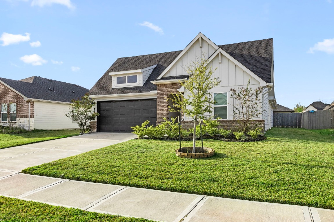 2732 Misty Elm Lane Rosenberg, TX 77469 - Photo 2 of 30 a front view of a house with a yard