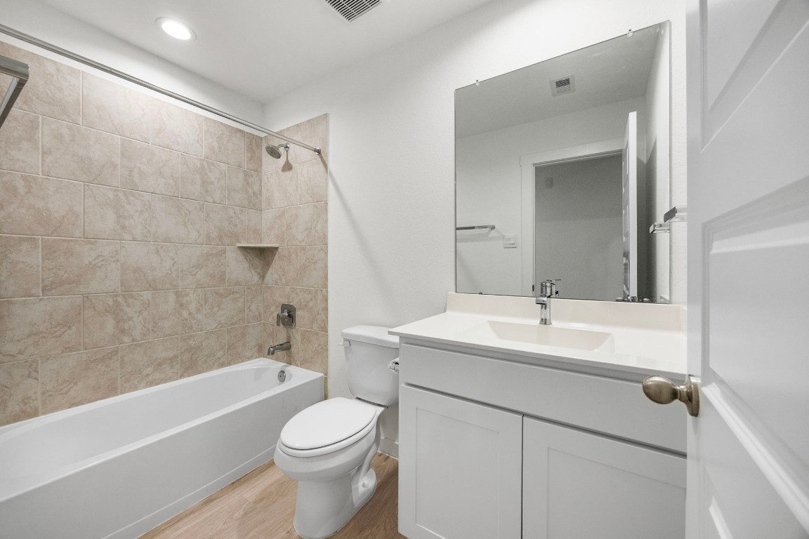 2732 Misty Elm Lane Rosenberg, TX 77469 - Photo 21 of 30 a bathroom with a sink a toilet and shower