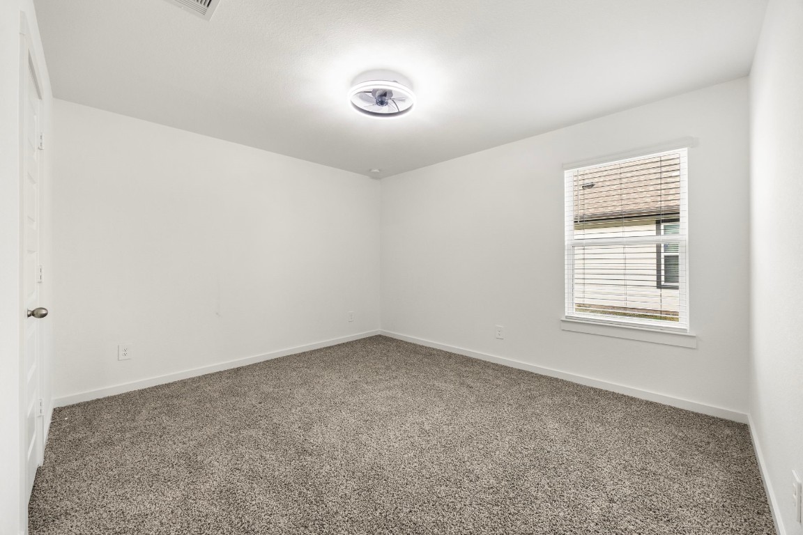 2732 Misty Elm Lane Rosenberg, TX 77469 - Photo 23 of 30 an empty room with a window