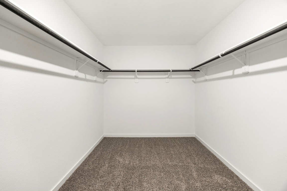 2732 Misty Elm Lane Rosenberg, TX 77469 - Photo 26 of 30 a view of a room with racks on the wall