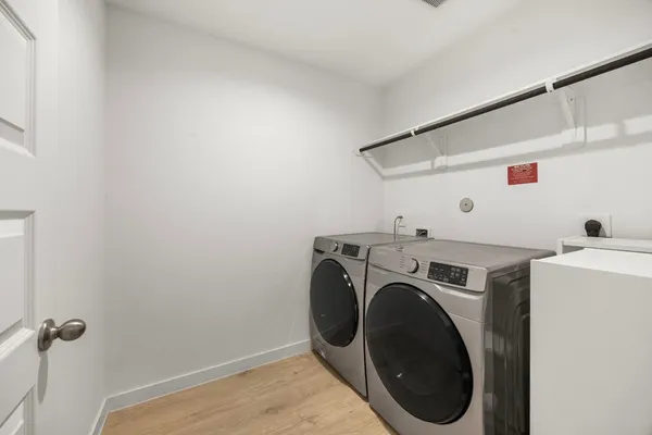 a utility room with dryer and washer