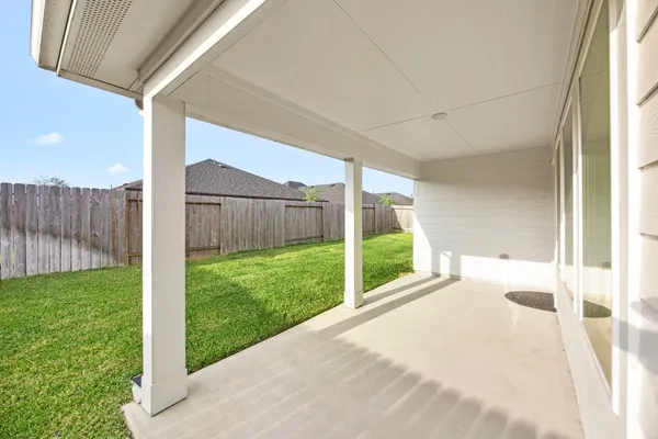a view of a porch with a big yard