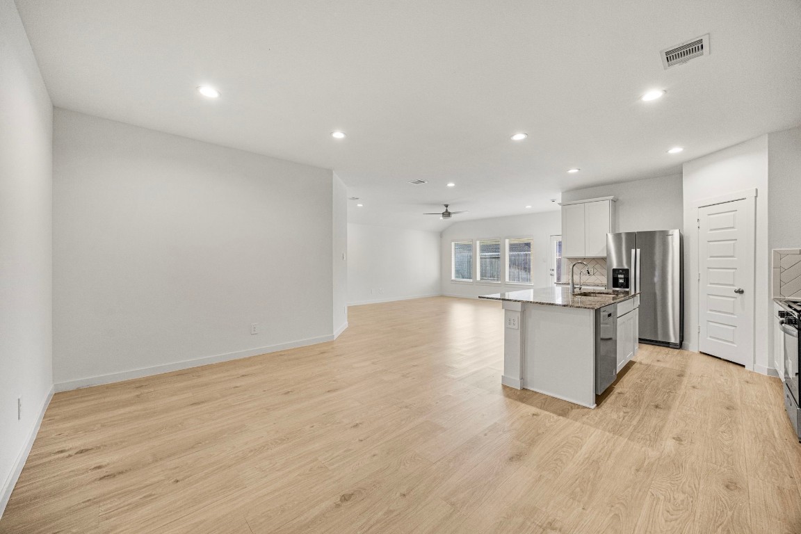 2732 Misty Elm Lane Rosenberg, TX 77469 - Photo 6 of 30 a view of kitchen with wooden floor