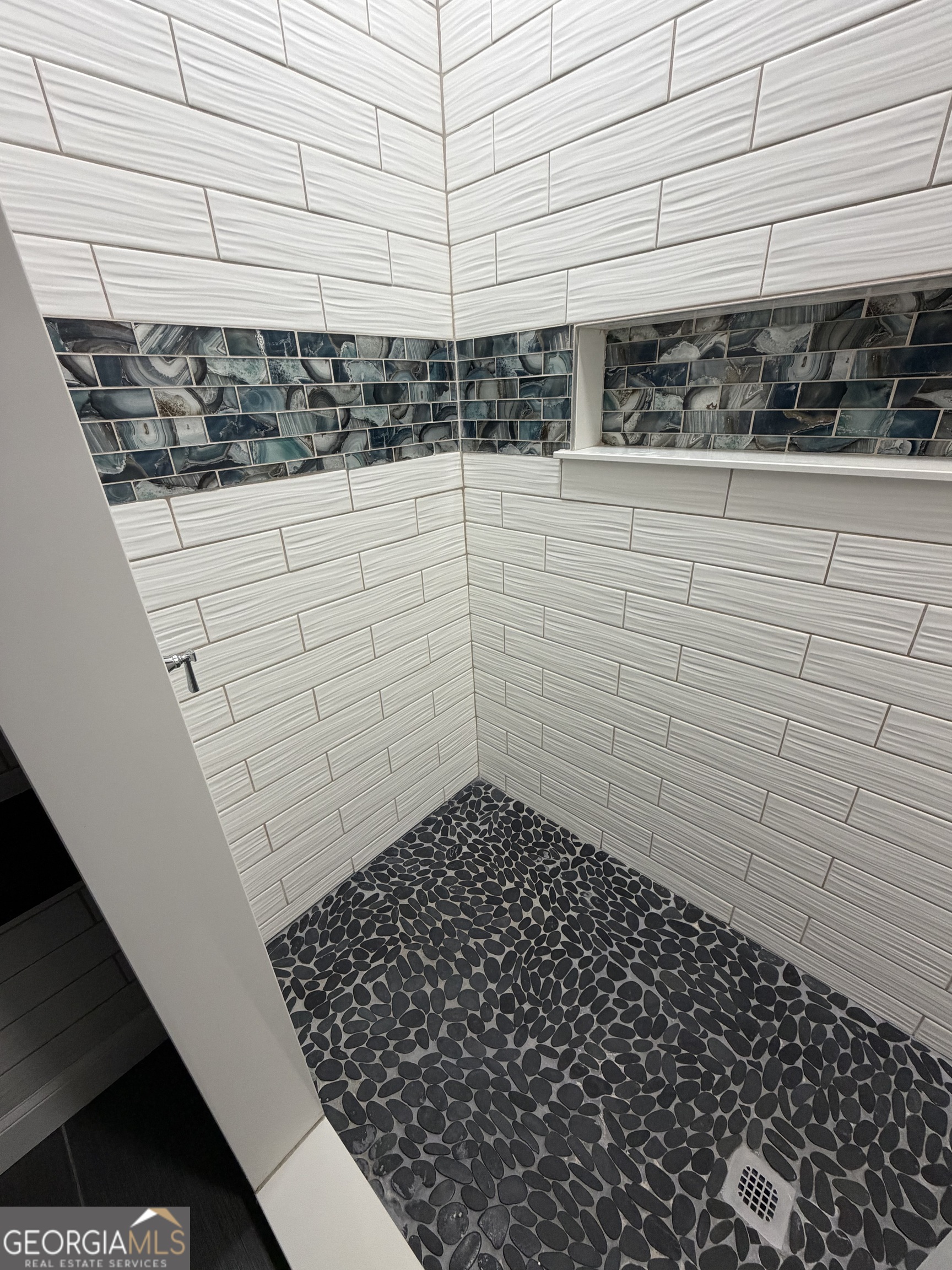 430 Bethany Road Covington, GA 30016 - Photo 26 of 39 a bathroom with a shower