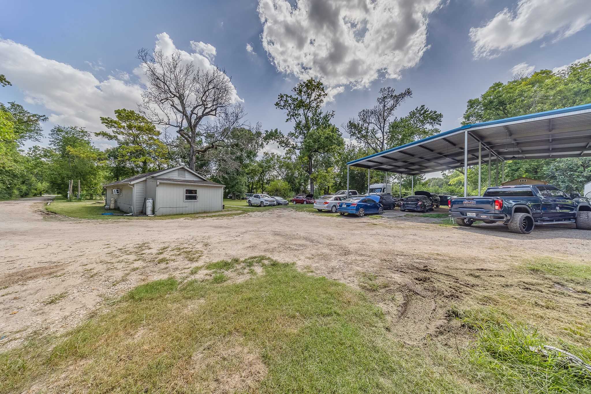 1725 Strawn Road Houston, TX 77039 - Photo 10 of 44 Follow the separate access to a rear work area designed for the buyer who needs serious usable space.