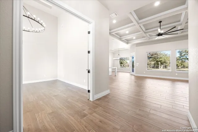 a bathroom with a toilet a sink and a mirror