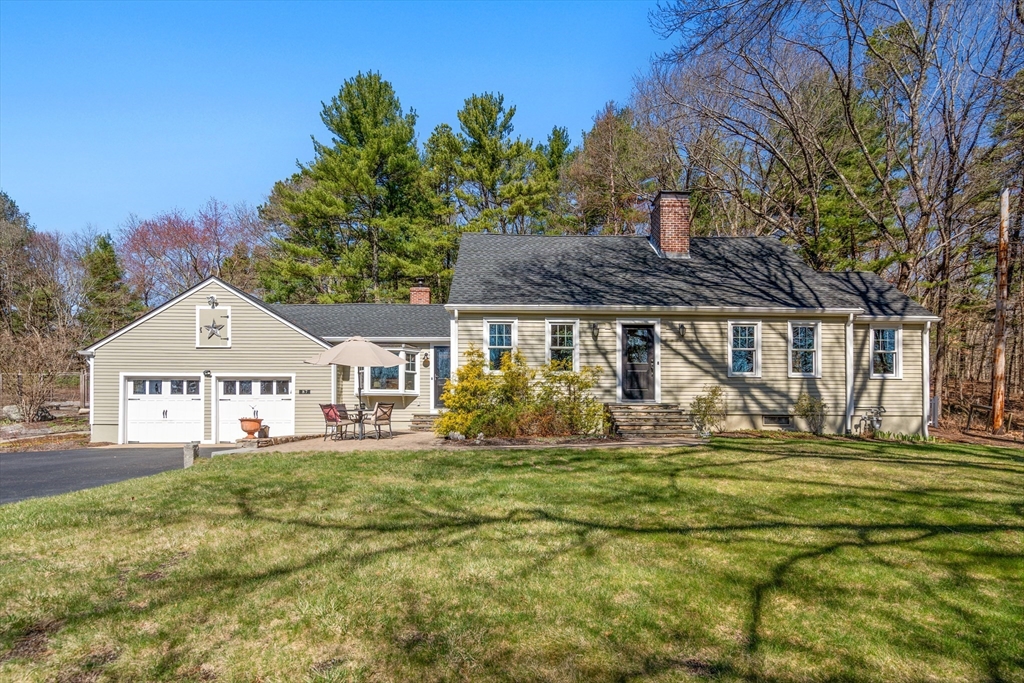 87 Dutton Road Sudbury, MA 01776 - Photo 1 of 41 a front view of a house with a garden