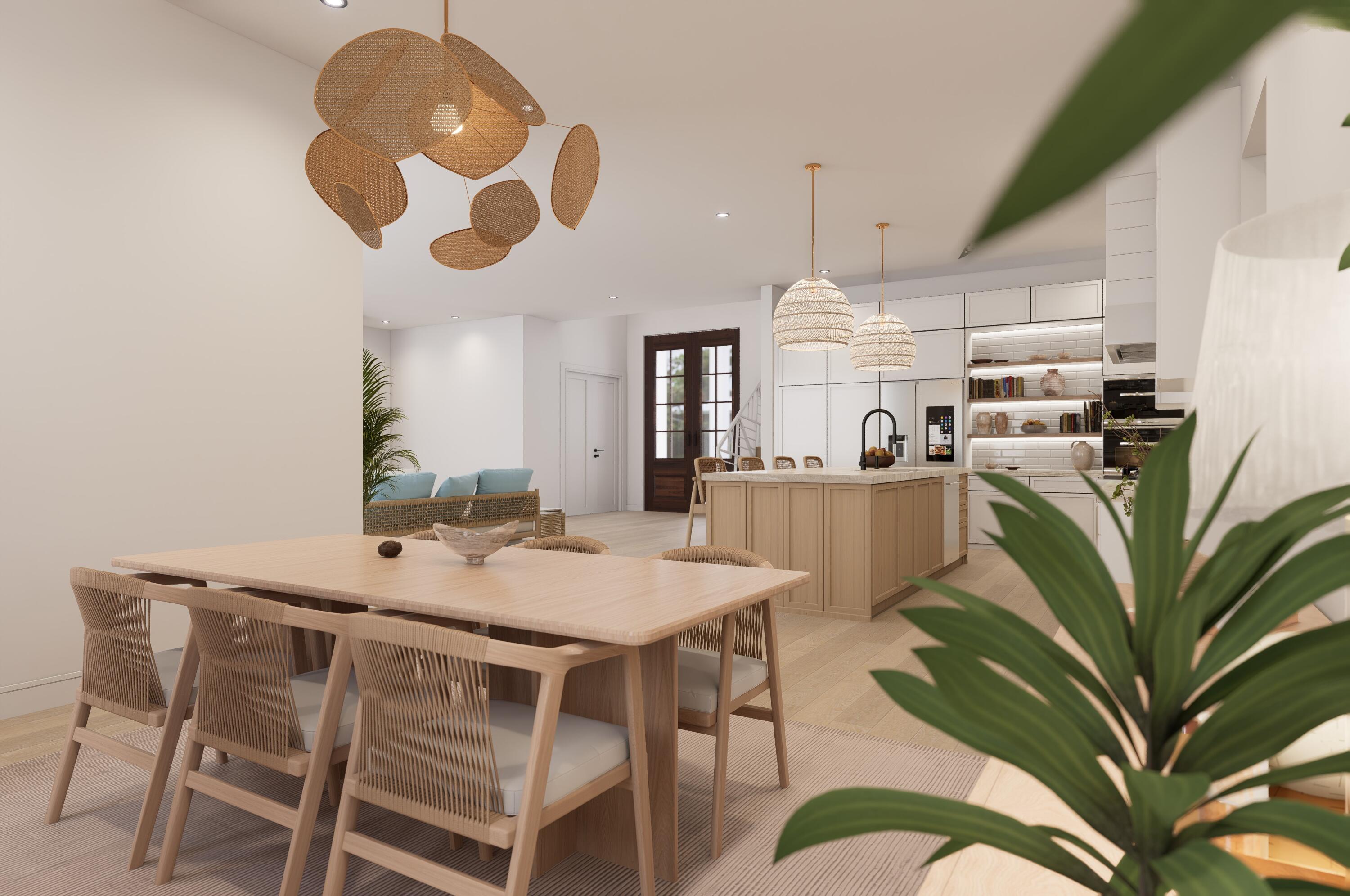 1041 Bimini Lane Singer Island, FL 33404 - Photo 14 of 26 a kitchen with stainless steel appliances kitchen island granite countertop a table chairs and a wooden floor