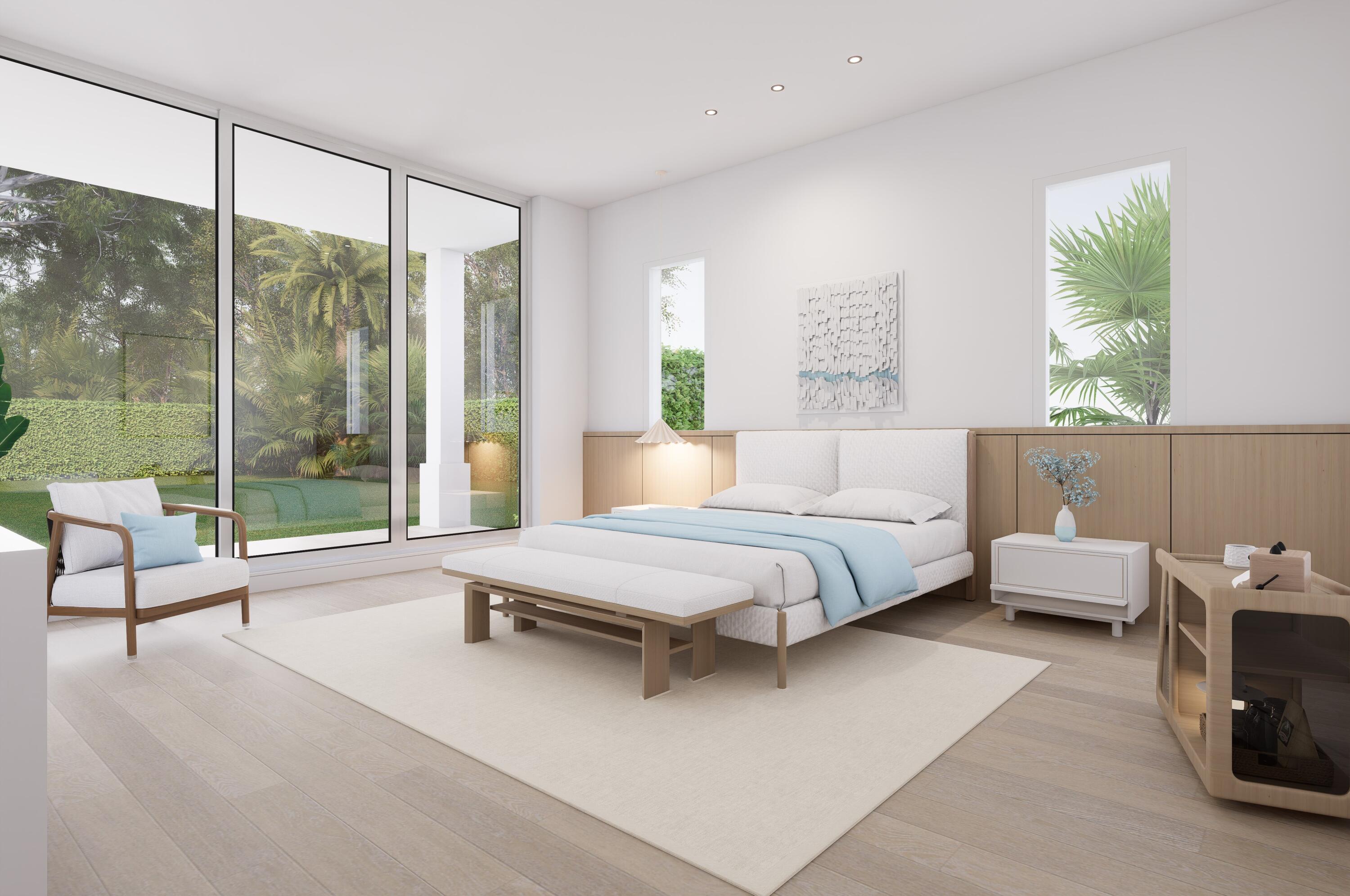 1041 Bimini Lane Singer Island, FL 33404 - Photo 18 of 26 a spacious bedroom with a bed and a large window