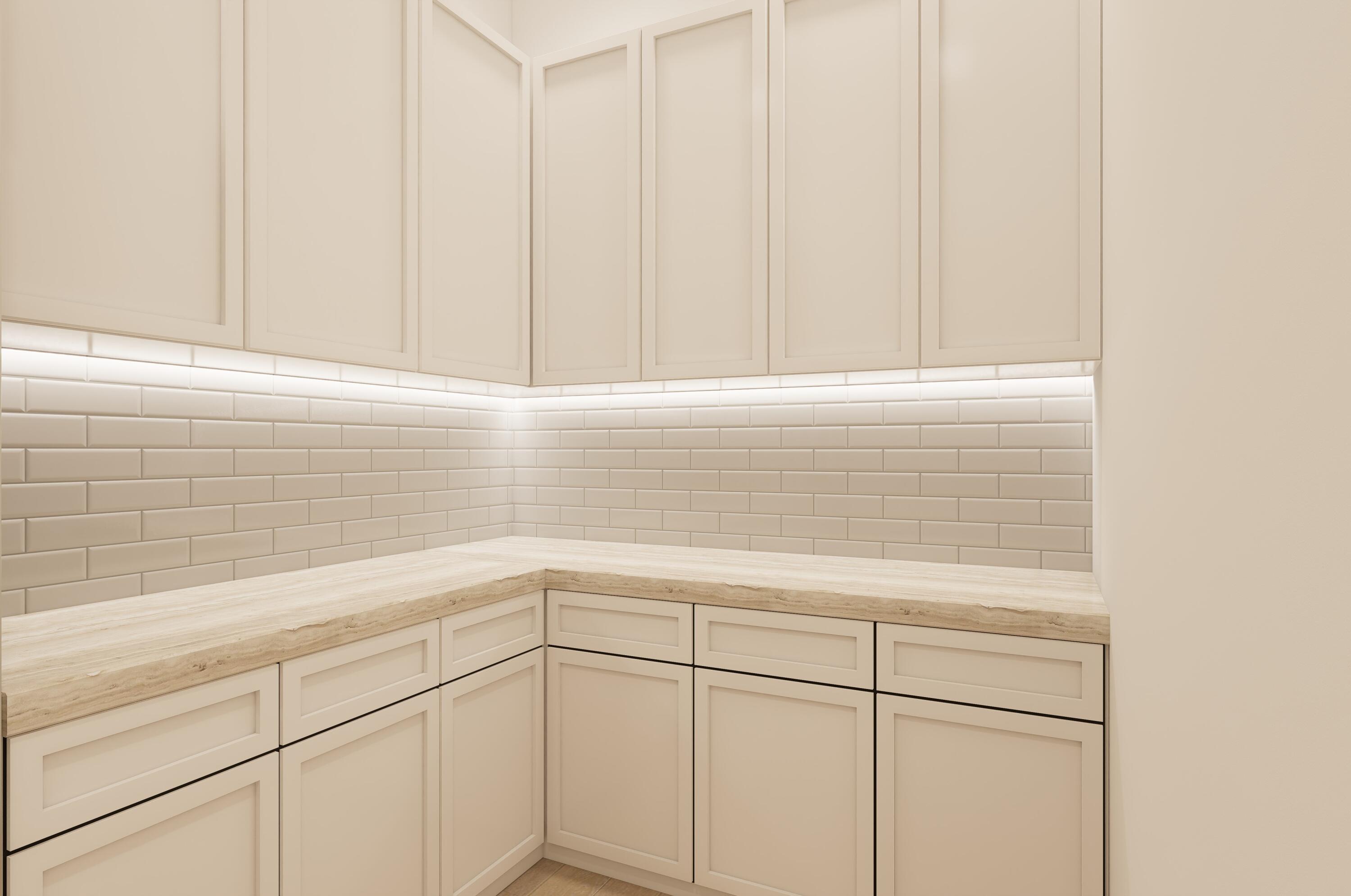 1041 Bimini Lane Singer Island, FL 33404 - Photo 26 of 26 a view of a kitchen with white cabinets