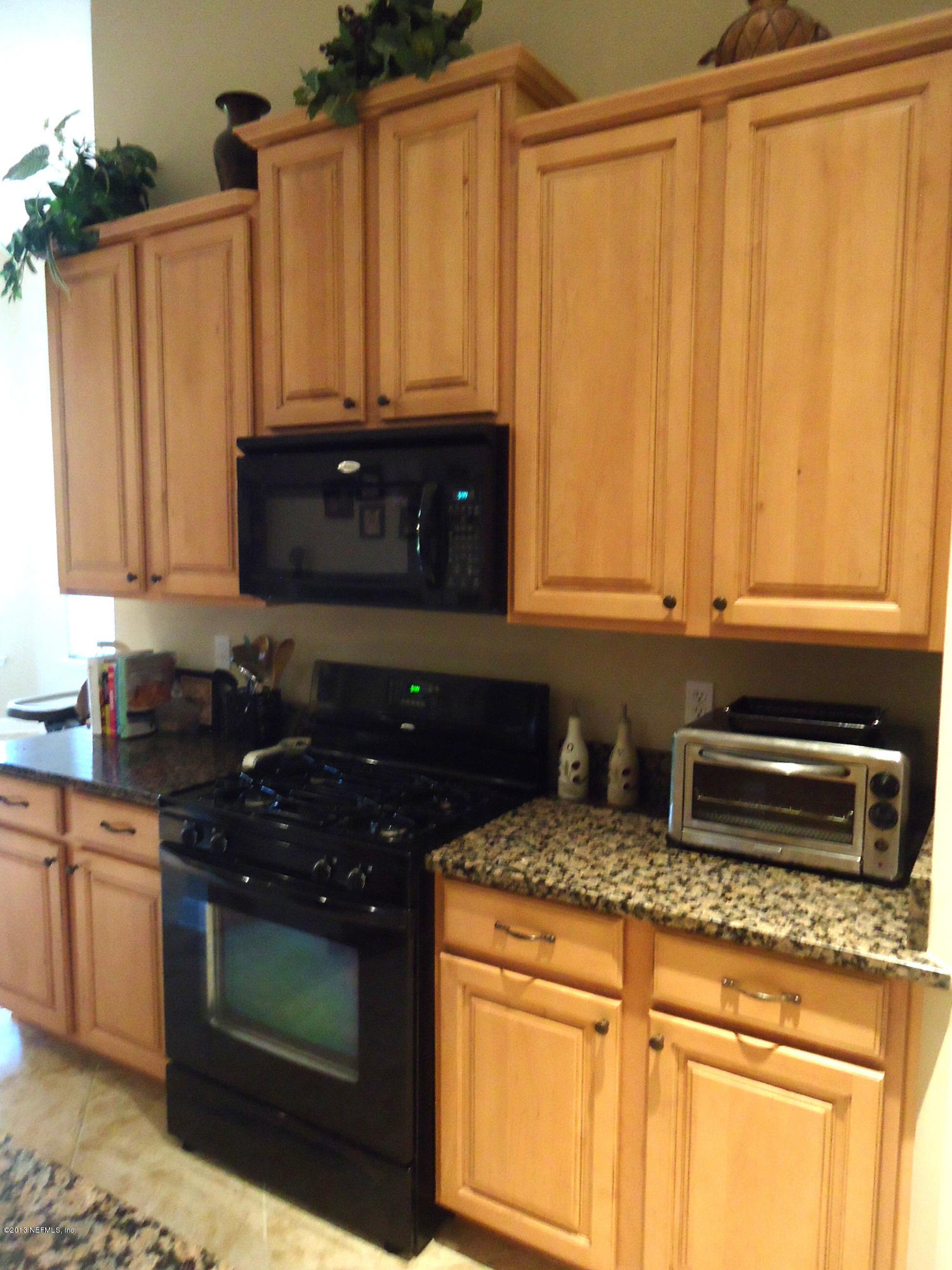 6074 Shadehill Road Jacksonville, FL 32258 - Photo 14 of 37 Abundance of Cabinets
