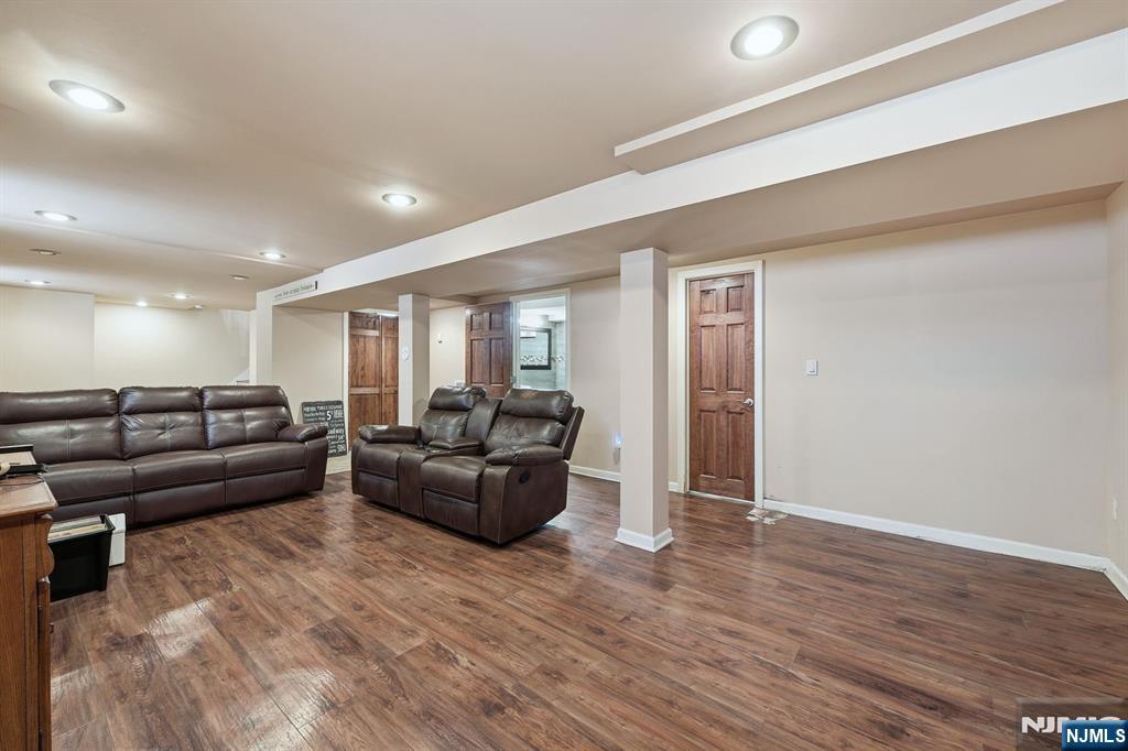 207 Elm Avenue Hackensack, NJ 07601 - Photo 25 of 38 a living room with furniture and wooden floor