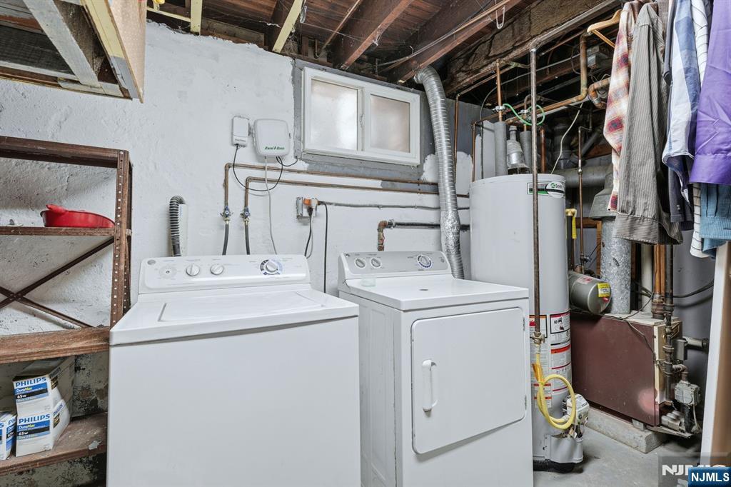 207 Elm Avenue Hackensack, NJ 07601 - Photo 29 of 38 a utility room with dryer and washer
