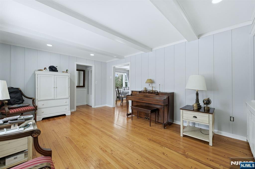 207 Elm Avenue Hackensack, NJ 07601 - Photo 4 of 38 a bed room with a bed and a chair in it