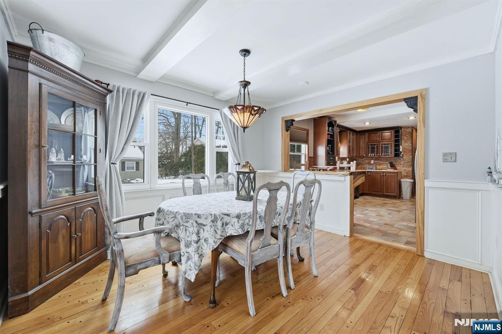 207 Elm Avenue Hackensack, NJ 07601 - Photo 5 of 38 a view of a dining room with furniture window and wooden floor