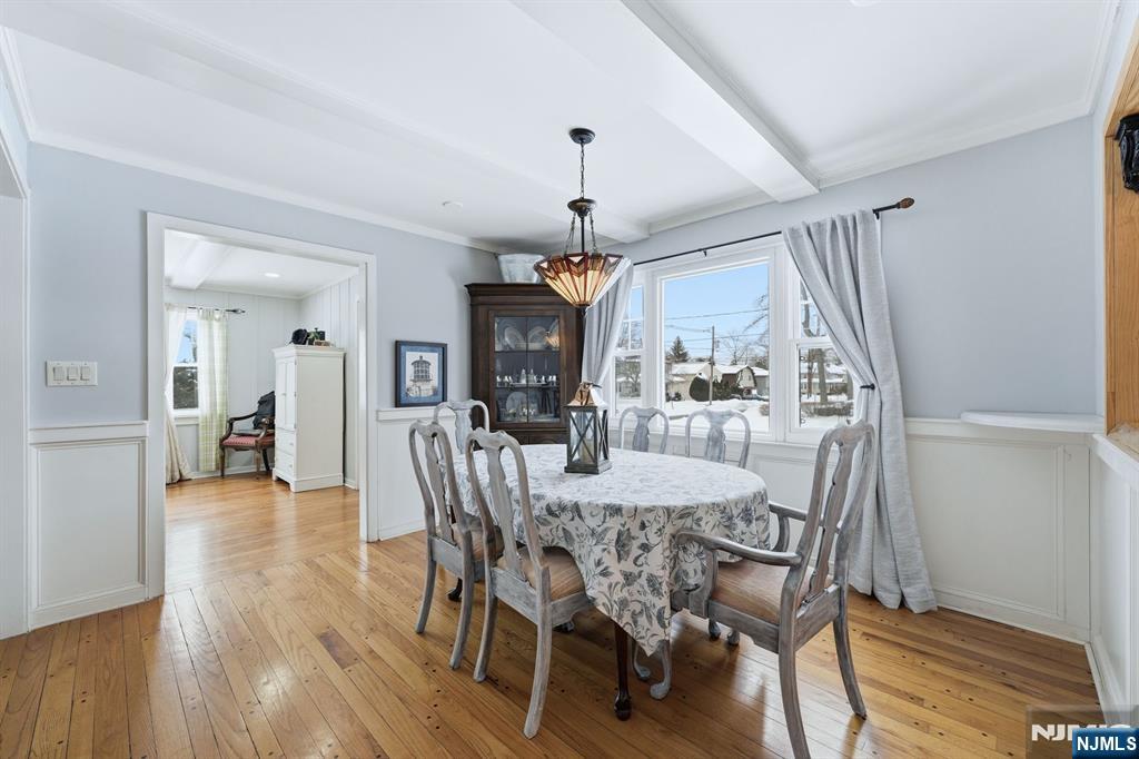 207 Elm Avenue Hackensack, NJ 07601 - Photo 6 of 38 a view of a dining room with furniture and wooden floor