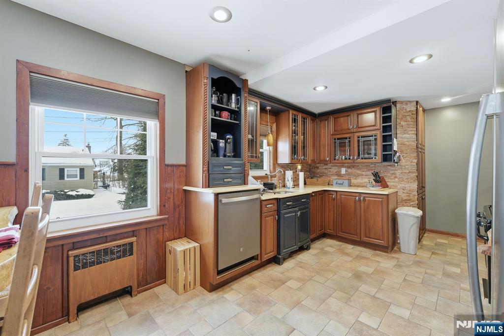 207 Elm Avenue Hackensack, NJ 07601 - Photo 8 of 38 a kitchen with a refrigerator and a sink