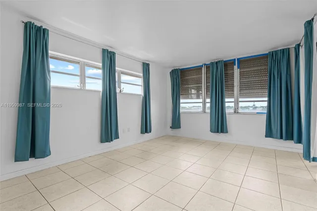 a view of an empty room with window