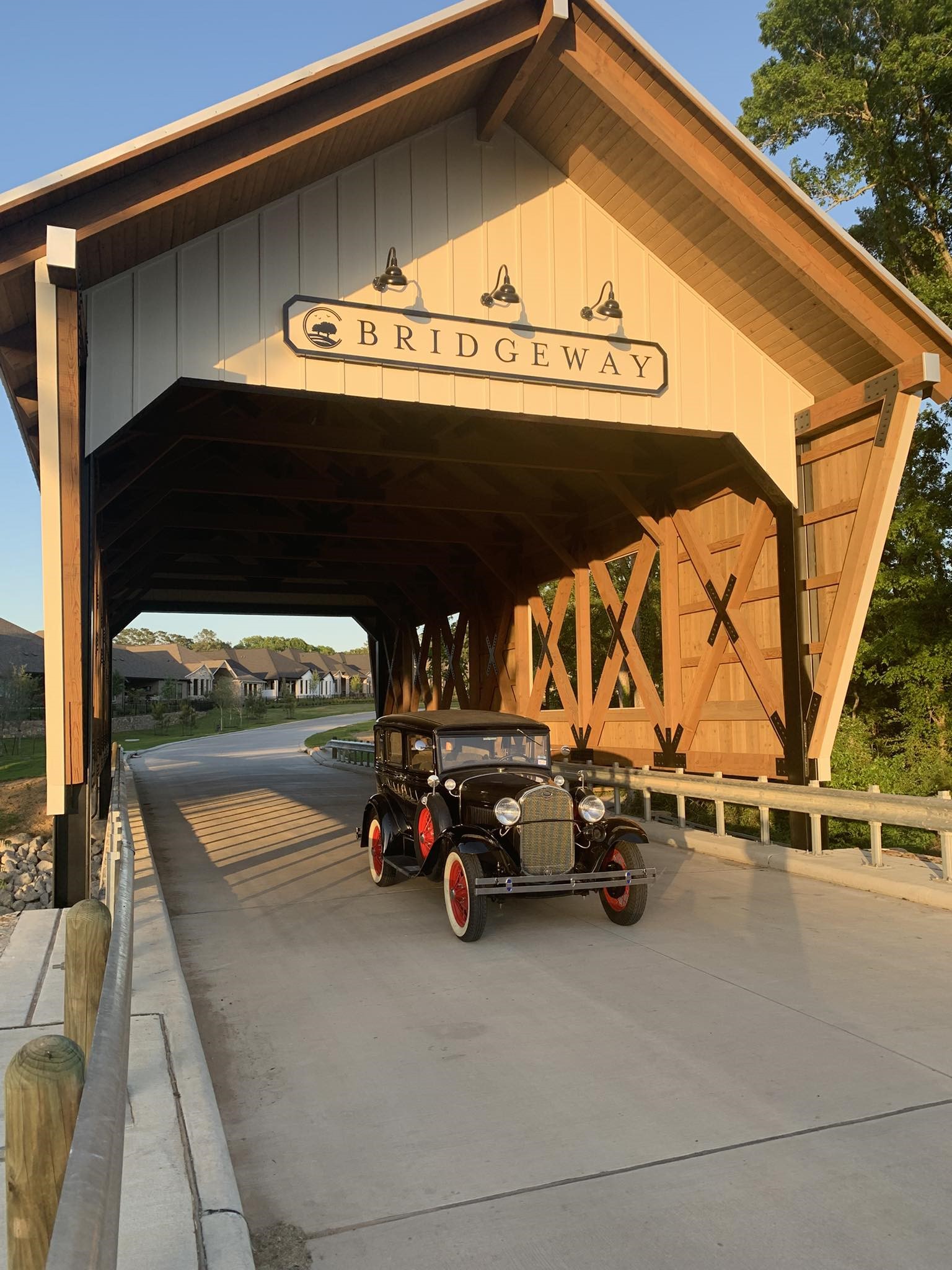 10026 Larkin Cove Willis, TX 77318 - Photo 39 of 46 Welcome to Bridgeway—one of Chambers Creek’s most picturesque and private sections. This charming covered bridge sets the tone for the timeless character and peaceful lifestyle that awaits beyond.