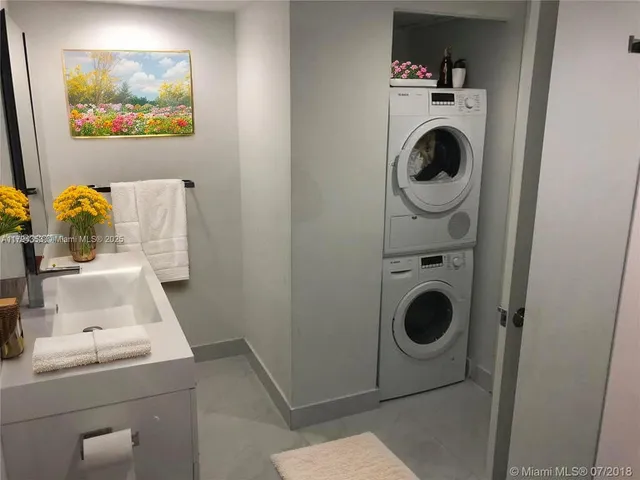 a picture of a wall with a white house