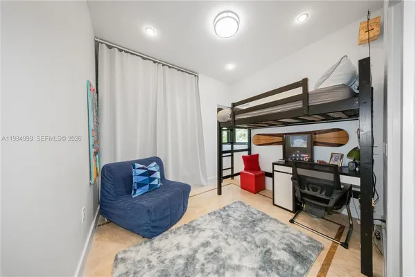 a bathroom with a toilet and a bathtub