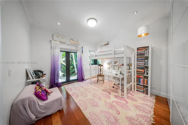 a bed room with two bed and a night stand