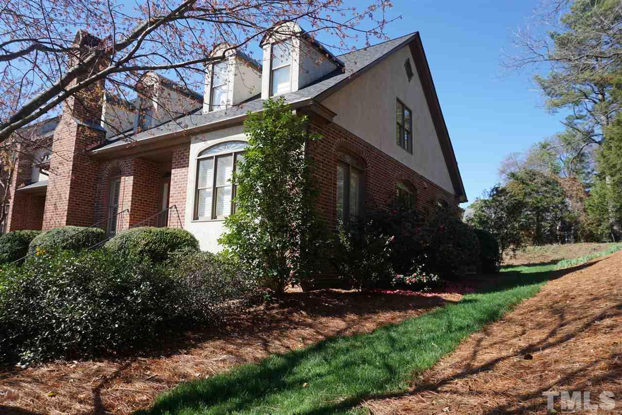 3330 Ridgecrest Court Raleigh, NC 27607 - Photo 2 of 25 a view of a white house with a yard