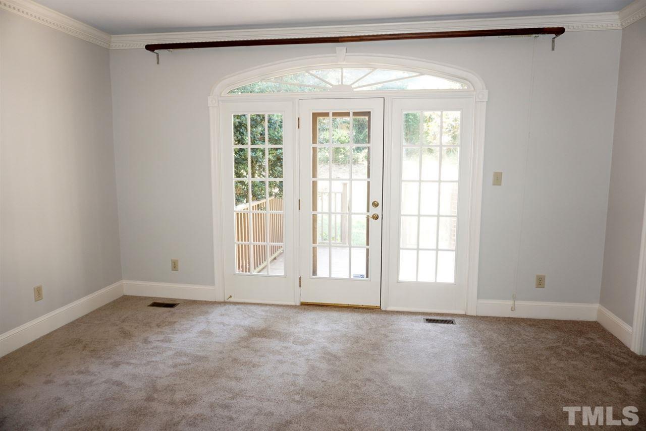 3330 Ridgecrest Court Raleigh, NC 27607 - Photo 13 of 25 a view of an empty room with a window