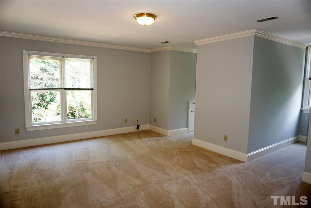 3330 Ridgecrest Court Raleigh, NC 27607 - Photo 16 of 25 a view of an empty room with a window