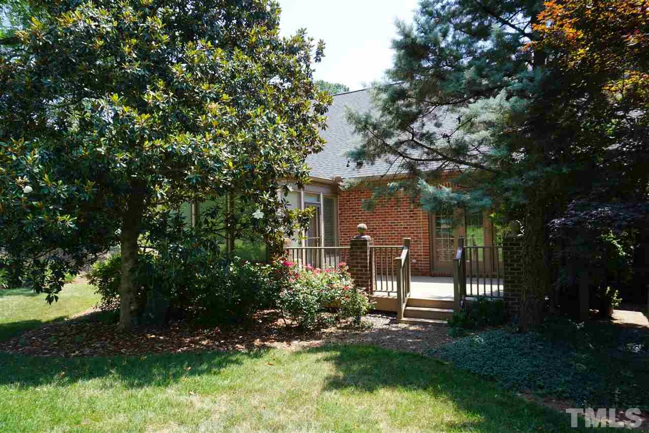 3330 Ridgecrest Court Raleigh, NC 27607 - Photo 3 of 25 a view of a house with a tree in a yard
