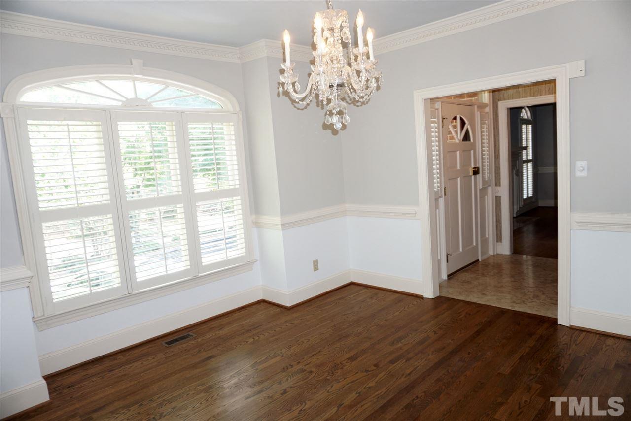 3330 Ridgecrest Court Raleigh, NC 27607 - Photo 7 of 25 a view of empty room with wooden floor and fan
